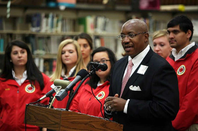 Little Rock Deputy Superintendent Marvin Burton is shown speaking during the press conference announcing the three-year, $150,000 dollar commitment partnership between the Little Rock Regional Chamber and Fifty for the Future and New Hall High School Wednesday, May 25, 2016.