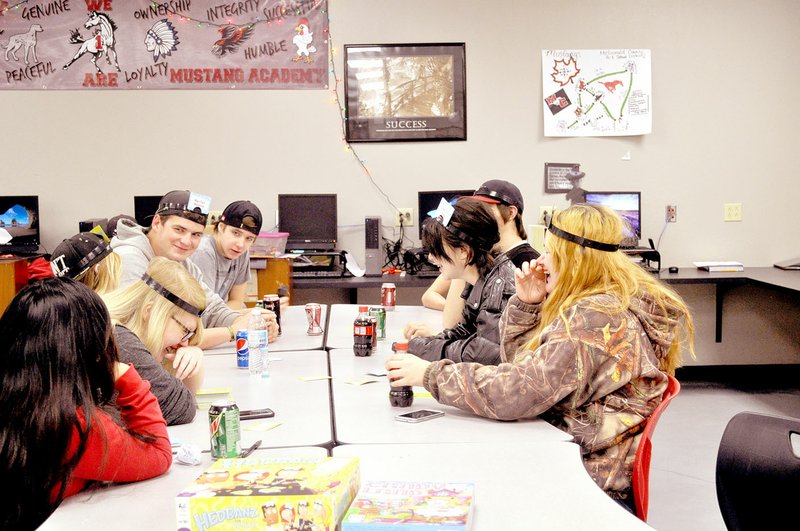 RACHEL DICKERSON/MCDONALD COUNTY PRESS Students at Mustang Academy play a game before a Christmas party on the last day before Christmas break.
