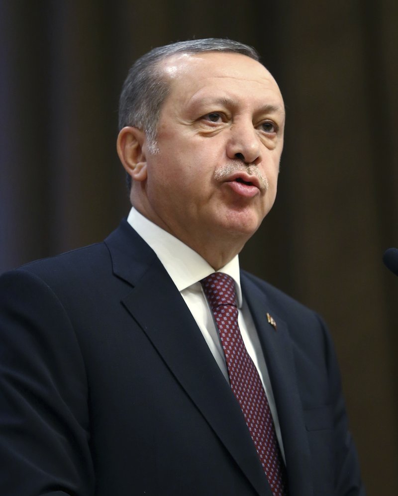 Turkey's President Recep Tayyip Erdogan addresses the audience during a presidential awards ceremony in Ankara, Turkey, Wednesday, Dec. 28, 2016.