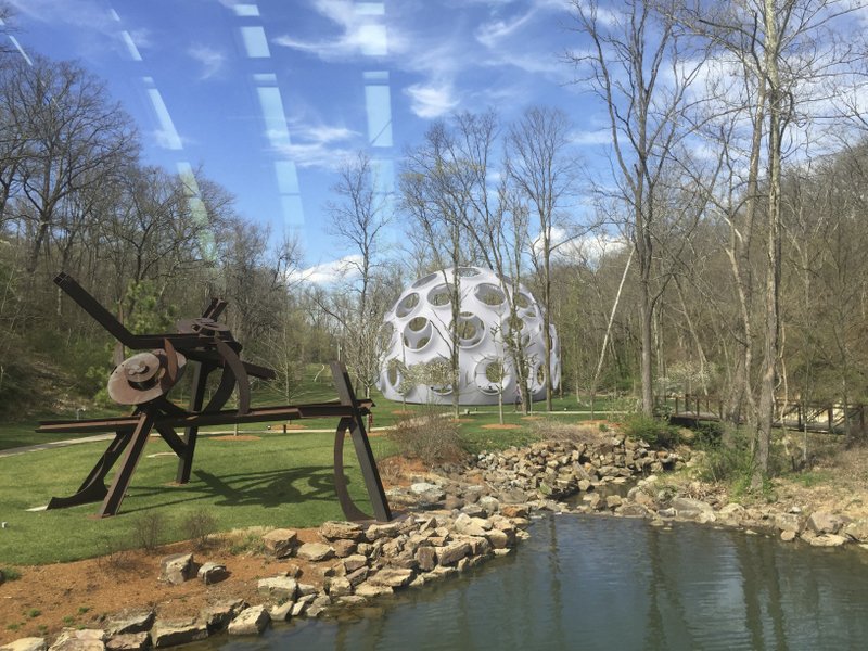 This computer illustration provided by the Crystal Bridges Museum of American Art on Dec. 28, 2016, shows a rendering of how inventor Buckminster Fuller's Fly's Eye Dome will look when installed on museum grounds in Bentonville, Ark. The museum recently told its patrons it intends to construct the futuristic dome in the summer of 2017. (Jessi Mueller/Crystal Bridges Museum of American Art via AP)
