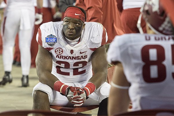Arkansas running back Rawleigh Williams watches the final seconds of the Razorbacks' 35-24 loss to Virginia Tech in the Belk Bowl on Thursday, Dec. 29, 2016, in Charlotte, N.C.