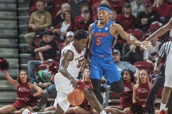 Florida's Kevaughn Allen guards Arkansas' Jaylen Barford during a game Thursday, Dec. 29, 2016, in Fayetteville. 