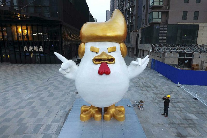 This sculpture resembling President-elect Donald Trump stands outside a shopping mall in Taiyuan, China, part of celebrations of the Chinese Year of the Rooster. During his political campaign, Trump blamed China for U.S. economic woes.
