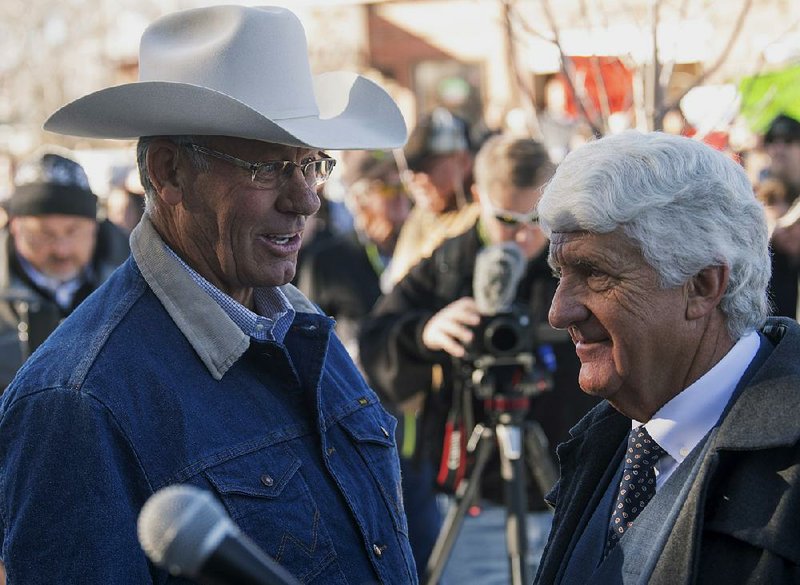 San Juan County Commissioner Bruce Adams (left) and U.S. Rep. Rob Bishop, R-Utah, discuss the new Bears Ears National Monument in Monticello, Utah.
