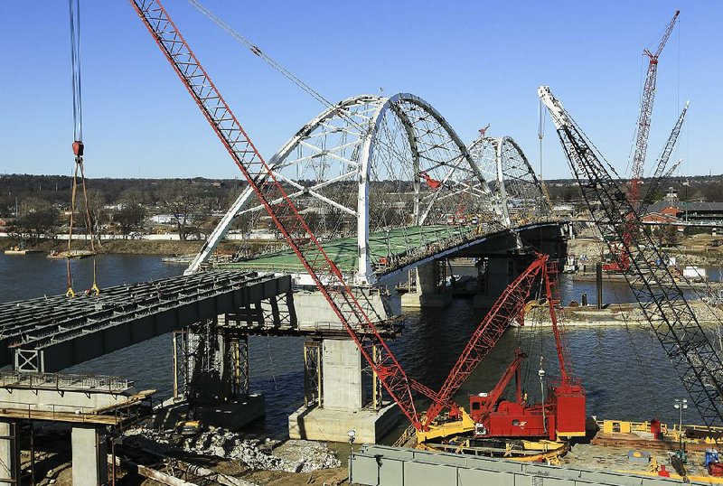 Work continues Thursday on the new Broadway Bridge. At midnight, the project officially reached the halfway mark in its 180-day contract period.