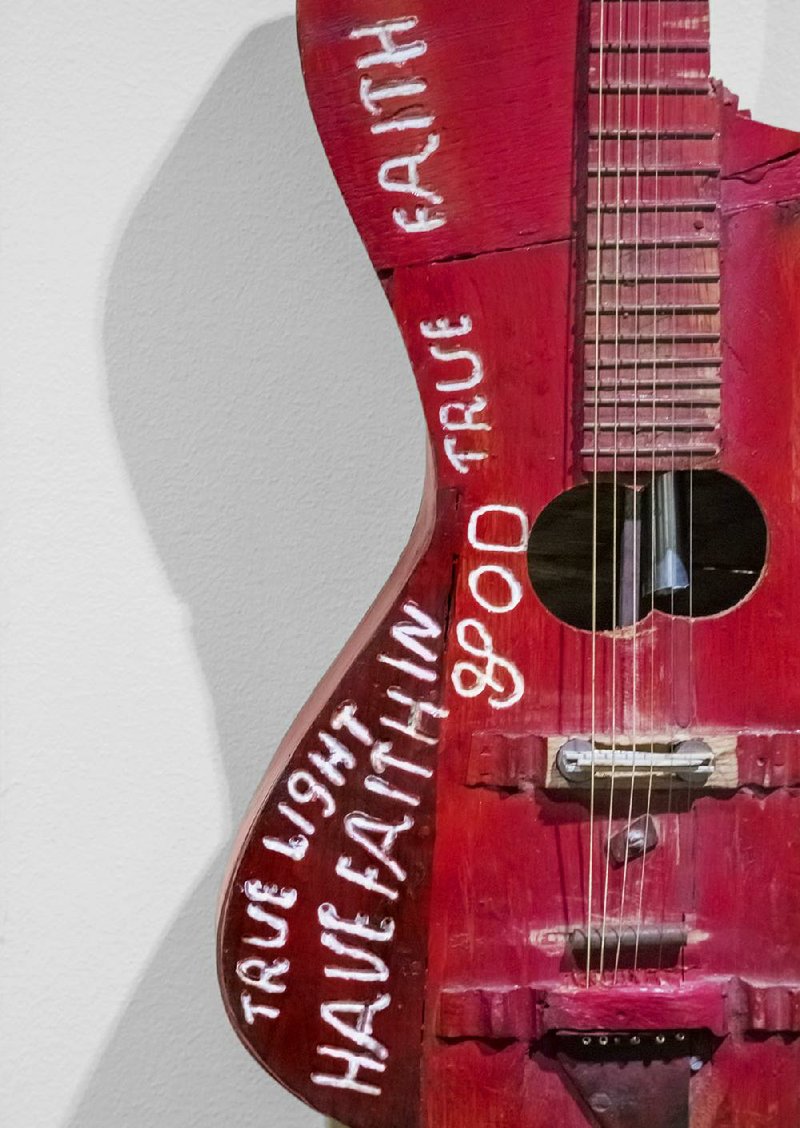 True Faith, True Light exhibit at the Old Statehouse Museum. Unique, odd, handmade guitars from Ed Stilley. 
