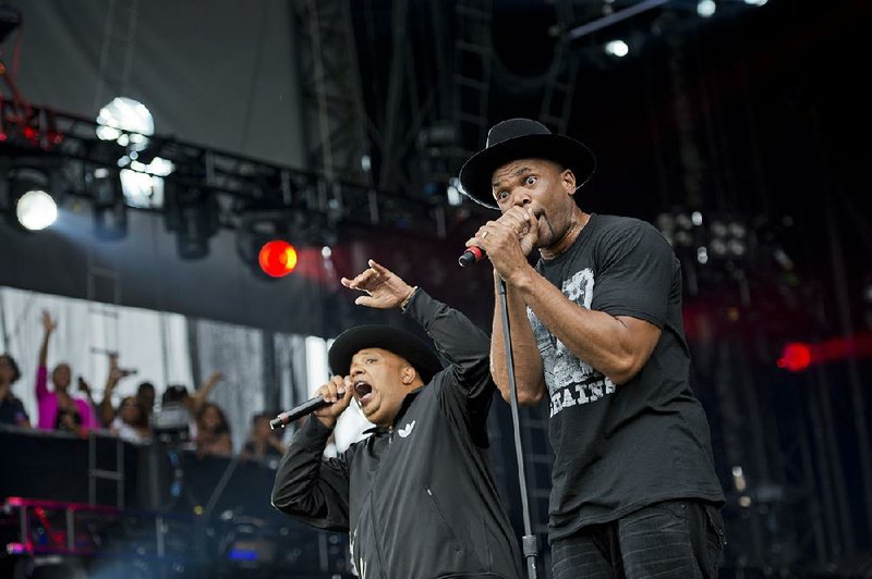 Joseph “Run” Simmons (left) and Darryl “DMC” McDaniels perform in 2012 in Philadelphia. McDaniels says in his lawsuit that the rap act’s brand is “extremely valuable.” 