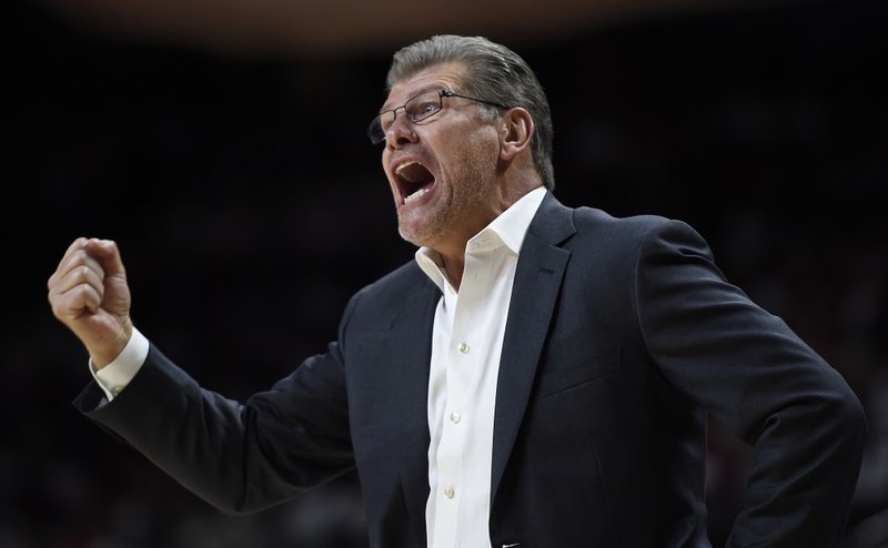 Connecticut coach Geno Auriemma calls to his team during the first half of an NCAA college basketball game against Maryland, Thursday, Dec. 29, 2016 in College Park, Md. 