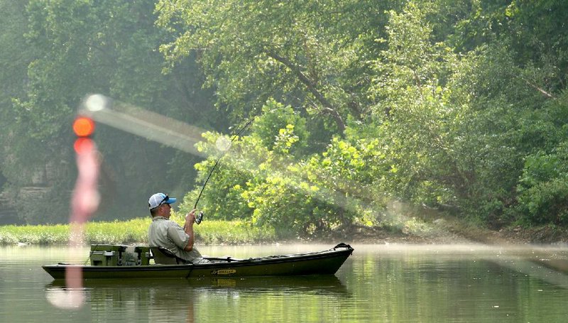 The new year brings new opportunities for fishing trips, like this float outing on War Eagle Creek in 2016 with Adam Ratcliffe. 