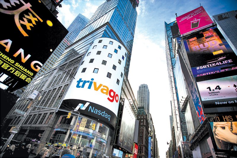 A sign for Trivago is displayed at the Nasdaq MarketSite in New York on Dec. 16. The Germany-based travel site, which is majority-owned by Expedia Inc., was one of the few companies to make public debuts in 2016. 