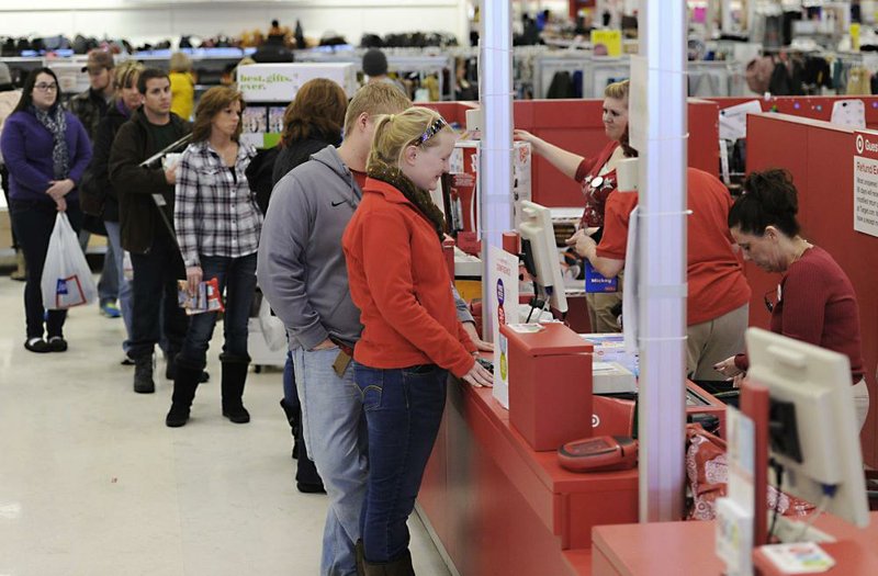 A shopper returns an item at a Target store in Summit Township, Pa., in this file photo. The return process for online purchases can still be a hassle for some consumers.