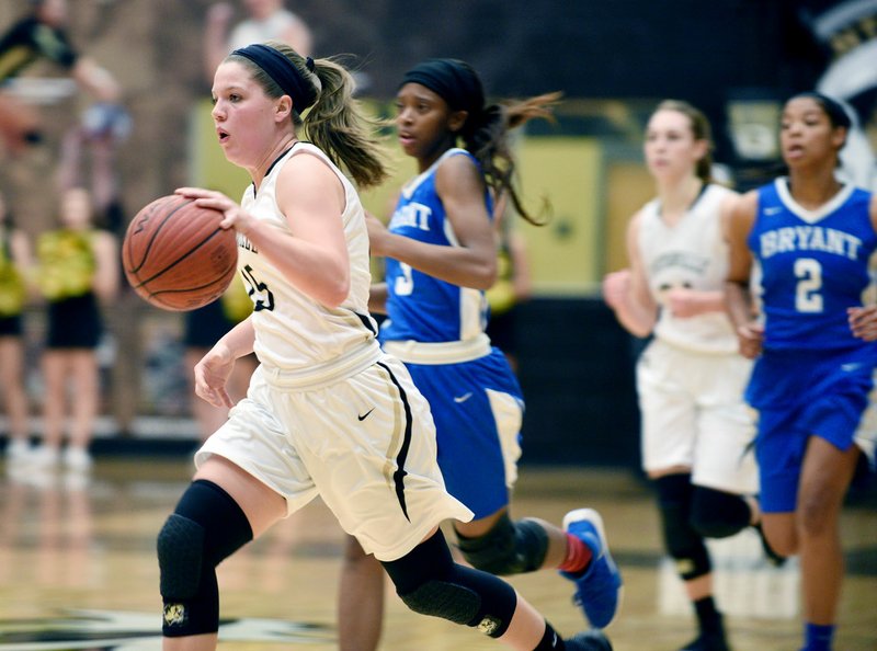 Bentonville High senior Abby Roberts drives down the floor against Bryant during a Dec. 1 game at the Crabtree Invitational in Tiger Arena.