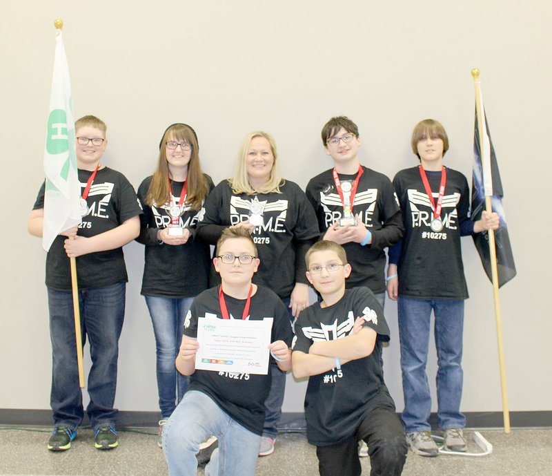Photo submitted The robotics team, PRIME, members of the Cooper 4-H Club, earned the ACE (Advancing to Championship Event) Award, the Core Value Award and Coach Cassie Smith won the Coach/Mentor Award at the FIRST Lego League regional competition. They are (in back) Ethan Rogers, Brooklyn Hoback, Smith, Treyton Smith, Cooper Allred, (in front) Ashton Hoback and Elijah Johnson
