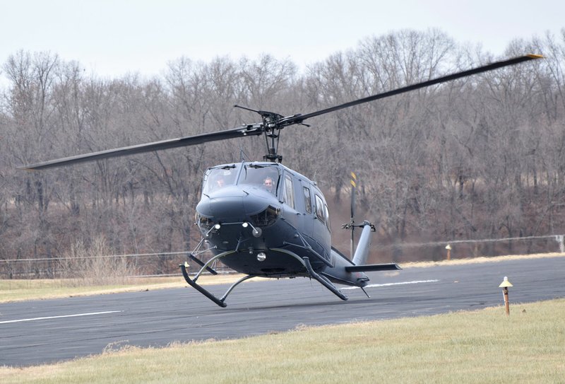Photo by Mike Eckels Normally reserved for fixed-wing aircraft, this Bell 205 make a perfect three-point landing on Runway 13 at Crystal Lake Airport near Decatur Dec. 21. This landing was part of an advanced training exercise in this type of aircraft.