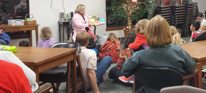 Photo submitted The library's Night Before Christmas Storytime was special because Santa himself stopped by for a visit.