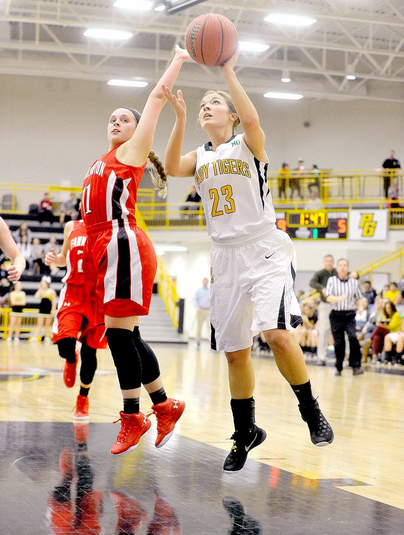 NWA Democrat-Gazette/MICHAEL WOODS/Prairie Grove guard Mattie Hartin (23) tries to drive past Farmington defender Camryn Journagan (11) during Hartin&#8217;s senior season. Mattie and her twin sister, Taylor Hartin, have been selected each as female Athlete of the Year at Prairie Grove for 2016 by the Enterprise-Leader.