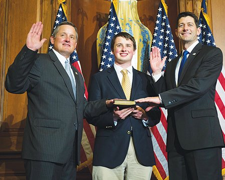 The Associated Press CAPITOL HILL: House Speaker Paul Ryan, of Wis., administers the House oath of office to Rep. Bruce Westerman, R-Ark., during a mock swearing in ceremony Tuesday on Capitol Hill in Washington.