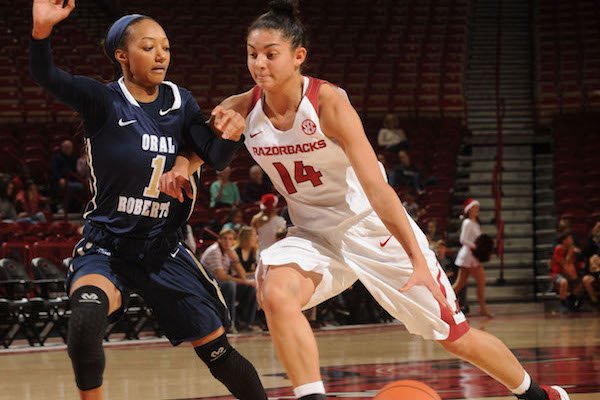 Jailyn Mason (14) of Arkansas drives to the lane as Kaylan Mayberry of Oral Roberts defends Wednesday, Dec. 21, 2016, during the second half of the Razorbacks' 70-60 loss in Bud Walton Arena. Visit nwadg.com/photos to see more photographs from the game.