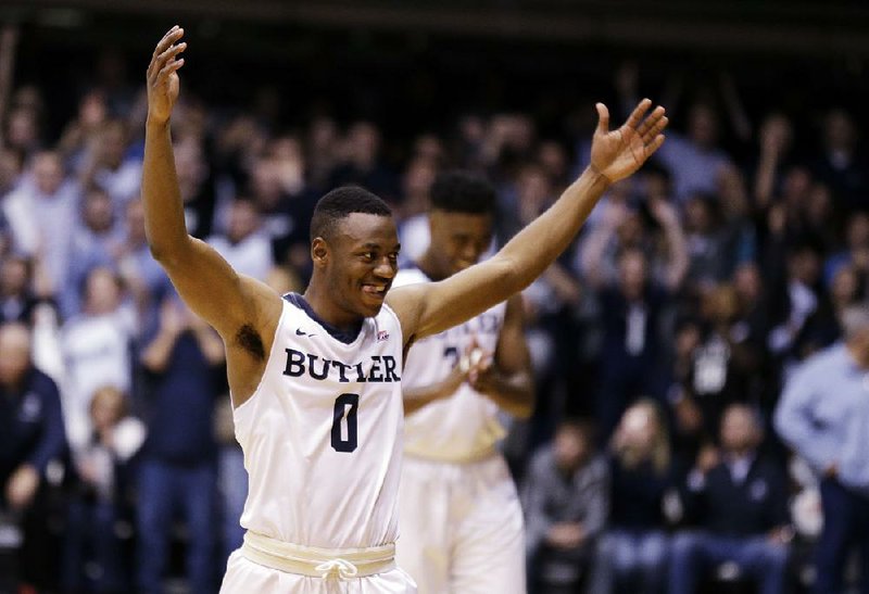 Butler guard Avery Woodson celebrates Wednesday during the fi nal seconds of the No. 18 Bulldogs’ victory over top-ranked Villanova at Indianapolis. 