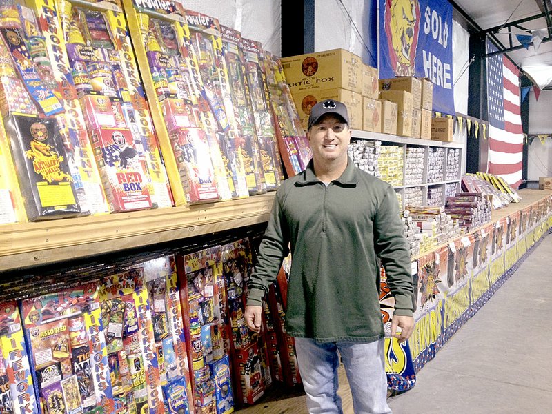 Sally Carroll/McDonald County Press Kyle Howell, site manager for Hale Fireworks, said local fireworks sales were up from last year. Local residents have taken advantage of the improved weather conditions and lack of burn bans to celebrate the New Year with fireworks.