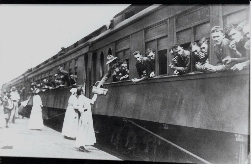 Women bidding farewell to troops leaving from the Rogers train station in 1917.

