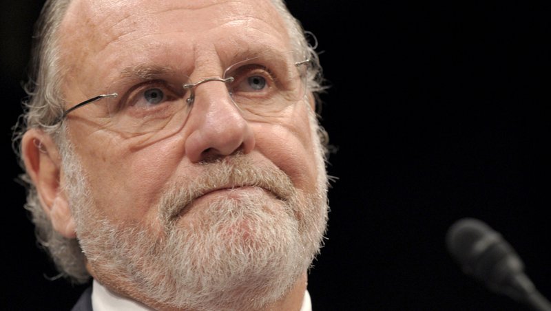 In this Thursday, Dec. 15, 2011, file photo, former MF Global Holdings Ltd. Chairman and Chief Executive Officer Jon Corzine testifies on Capitol Hill in Washington before the House Financial Services Committee. 