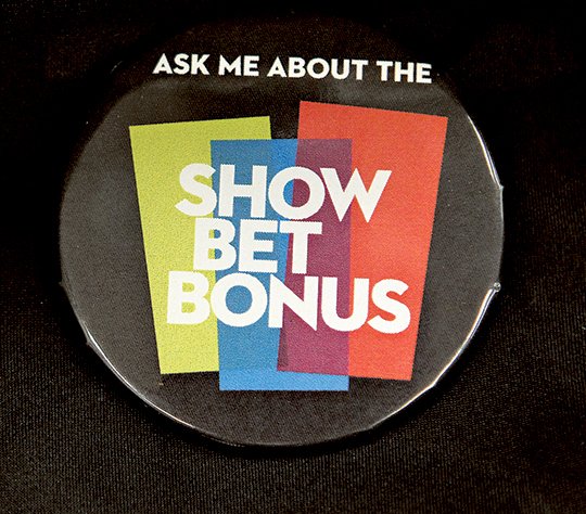 The Sentinel-Record/Richard Rasmussen SHOW BET BONUS: One of the buttons that will be worn by parimutuel clerks during the live race meet, which begins Jan. 13.