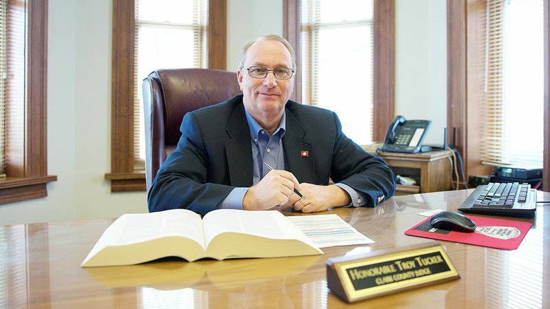 Clark County Judge Troy Tucker sits at his desk in his office on the second floor of the Clark County Courthouse. He was sworn in Jan. 1 and said he looks forward to serving the people of Clark County.