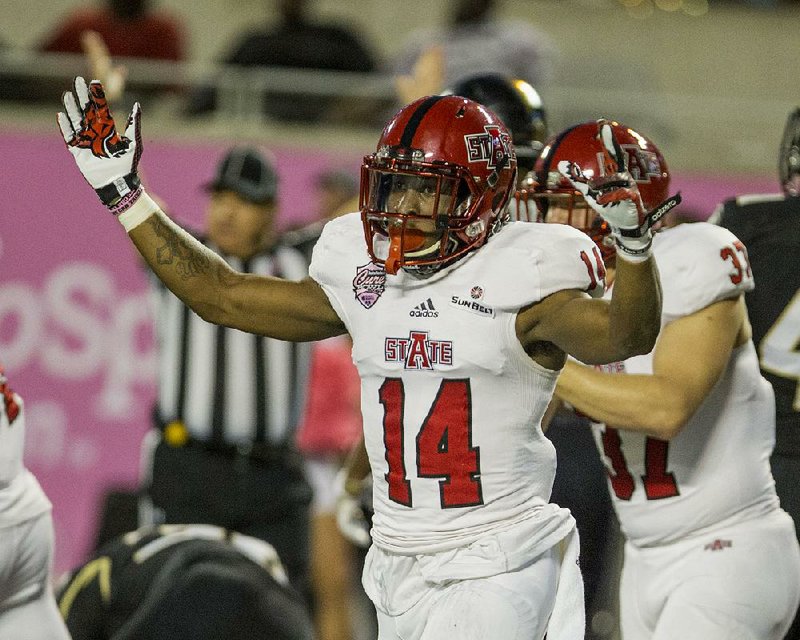 Arkansas State wide receiver Chris Murray and the Red Wolves knocked off Central Florida 31-13 in the Cure Bowl on Dec. 17. In all, Sun Belt Conference teams went 4-2 in bowl games, a mark that topped the league’s 2-2 finish during the 2015 season.
