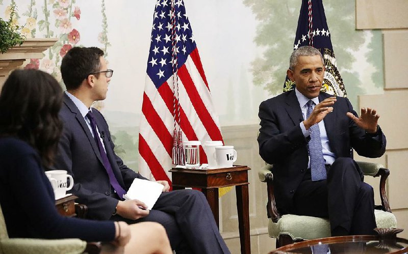 President Barack Obama talks Friday with news site Vox’s Ezra Klein and Sarah Kliff during a livestreamed interview at Blair House, across the street from the White House.