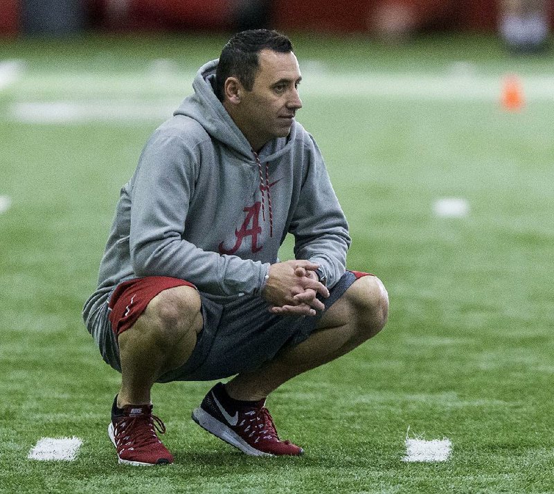 Analysts like Alabama’s Steve Sarkisian (above), who was promoted to offensive coordinator this week, give teams extra manpower in the coaching department while following NCAA rules.