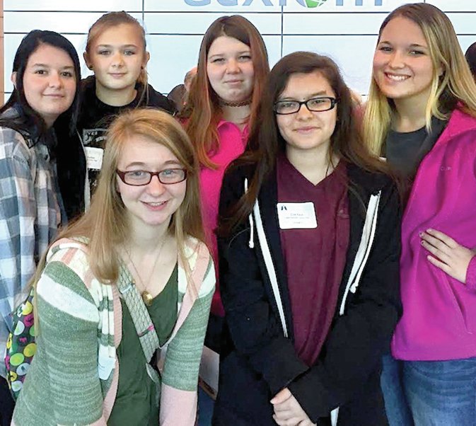 Submitted photo A group of Lake Hamilton Junior High students in Karma Turner's computer science classes recently attended the Girls of Promise Coding Summit, sponsored by the Women's Foundation of Arkansas in collaboration with Code.org and the office of Gov. Asa Hutchinson. The summit was held at Acxiom Corp. in Little Rock as part of Computer Science Education Week. Participating students included Whitney Caldwell, front, left, and Zoie Keys, and back, from left, Kyndrid Lugo-Ball, Paige Hunker, Jasmine Alexander and Kayla Ames'.