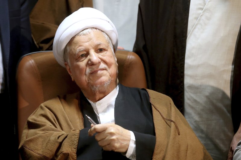 In this Dec. 21, 2015 file photo, former Iranian President Akbar Hashemi Rafsanjani, registers his candidacy for the elections of the Experts Assembly in Tehran, Iran. Iranian state media said Sunday, Jan. 8, 2017 that influential former President Akbar Hashemi Rafsanjani has died at age 82 after having been hospitalized because of a heart condition. Rafsanjani, who served as president from 1989 to 1997, was a leading politician who often played kingmaker in the country's turbulent politics. He supported President Hassan Rouhani. 