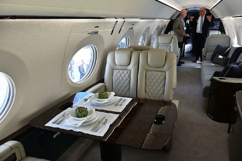 Attendees inspect the interior cabin of the new Gulfstream Aerospace G500 during the NBAA Business Aviation Convention & Exhibition in Orlando, Fla. in November.