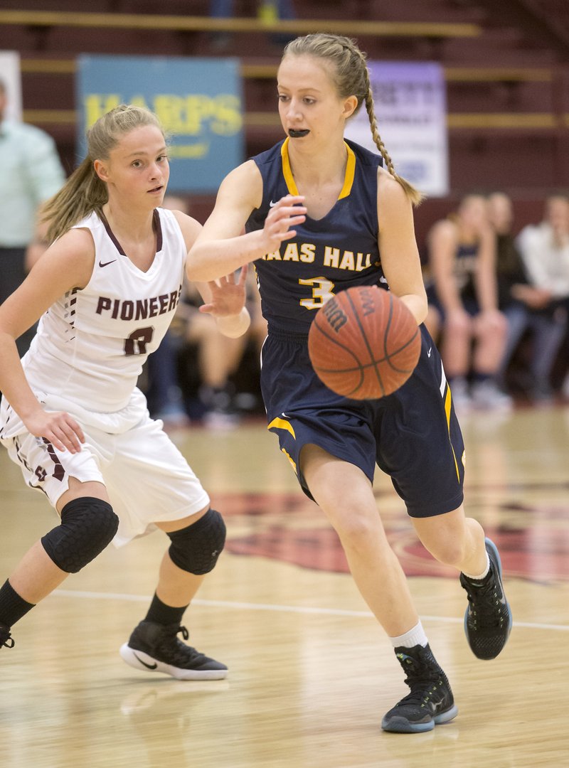 Haas Hall senior Angela Saitta (3) dribbles to the basket Jan. 3 against Gentry in a 3A/4A District 1 game in Gentry. Saitta scored 21 points in the contest and is averaging 17.9 points per game this season. She also scored a 34 on the ACT and carries a 4.19 GPA.