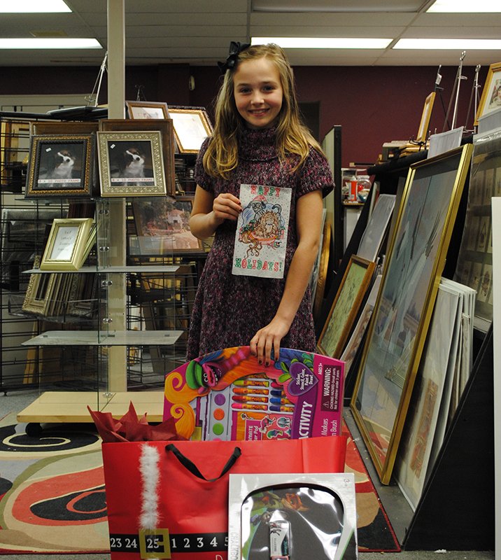 Submitted photo Shaylin Reynolds, of Hot Springs, won the The Sentinel-Record coloring contest sponsored by LaRue Custom Framing/Von Tobel Art Restoration. Reynolds was awarded a $100 gift certificate to LaRue Custom Framing and a prize package.