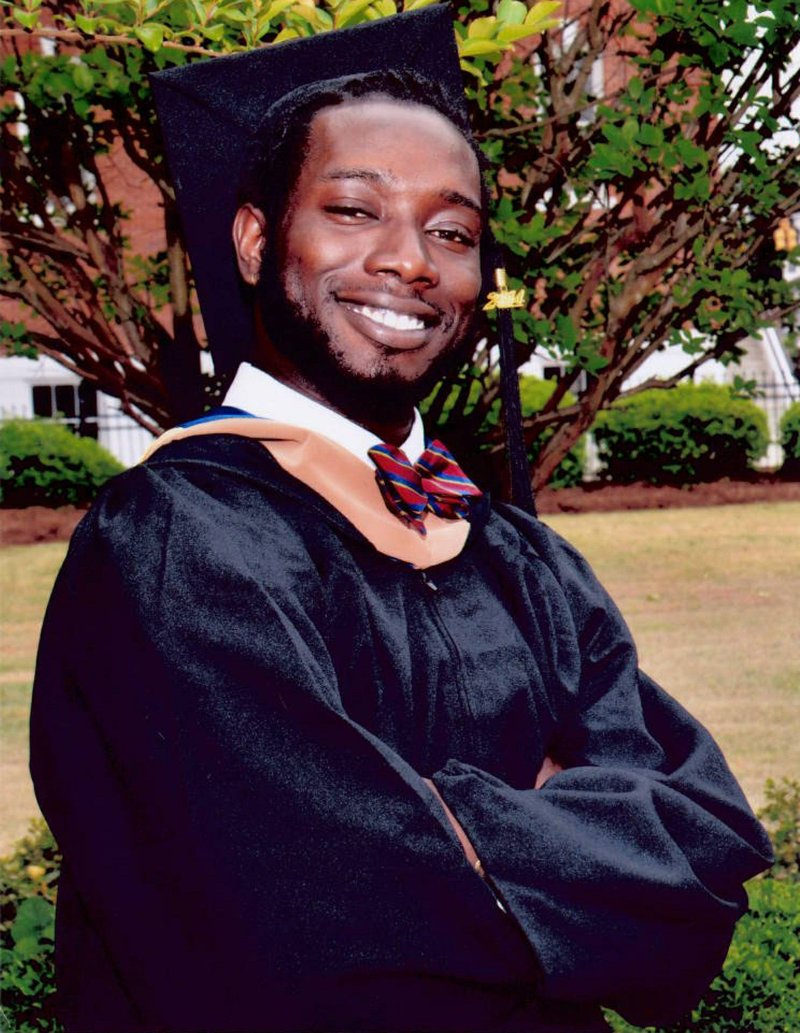 FILE-In this undated file photo made available by Anita Brewer Dantzler shows Tywanza Sanders on the day of his graduation from Allen University in Columbia, SC. 