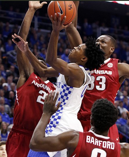 The Associated Press CROWDING FOX: Arkansas' Adrio Bailey (2), Moses Kingsley (33) and Jaylen Barford (0) join forces against Kentucky's De'Aaron Fox, center, in Saturday's matchup in Lexington, Ky. Arkansas' Trey Thompson, who has been the backup for Kingsley most of the season, will take the floor with Kingsley tonight against Mississippi State.