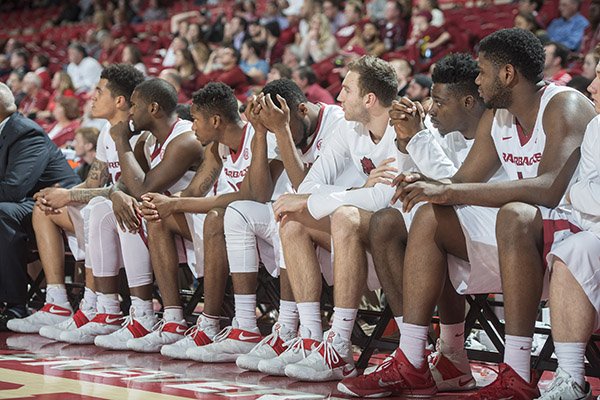 Arkansas players watch the final moments of an 84-78 loss to Mississippi State on Tuesday, Jan. 10, 2017, in Fayetteville. 