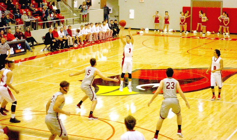 Photo by Mark Humphrey/Enterprise-Leader Farmington senior Matt Wilson unleashed this deep 3-pointer from well beyond the arc before Siloam Springs&#8217; defenders were even thinking about guarding him. Nine seconds into a Jan. 3 game at Cardinal Arena, Wilson had the first three of his career-high and school-record 49 points in a 70-48 win over the Panthers.