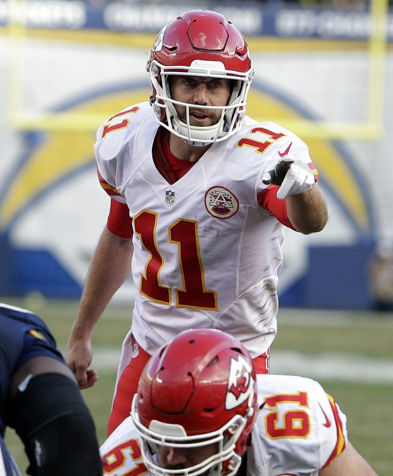  In this Sunday, Jan. 1, 2017, file photo, Kansas City Chiefs quarterback Alex Smith (11) gestures at the line of scrimmage during an NFL football game against the San Diego Chargers in San Diego. 