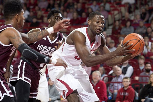 Arkansas center Moses Kingsley rebounds the ball during a game against Mississippi State on Tuesday, Jan. 10, 2017, in Fayetteville. 
