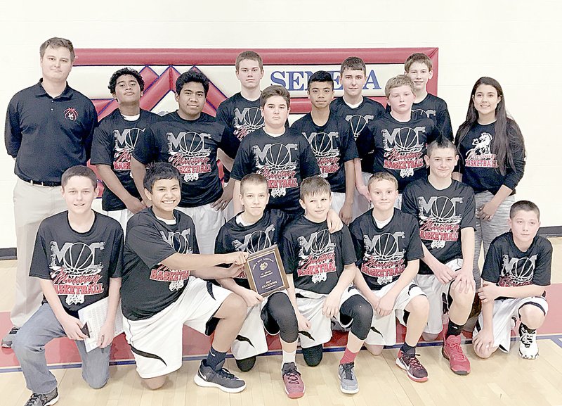Photo submitted The McDonald County seventh-grade boys&#8217; basketball team opened the 2017 season by winning last week&#8217;s Seneca Seventh Grade Boys Basketball Tournament. ^