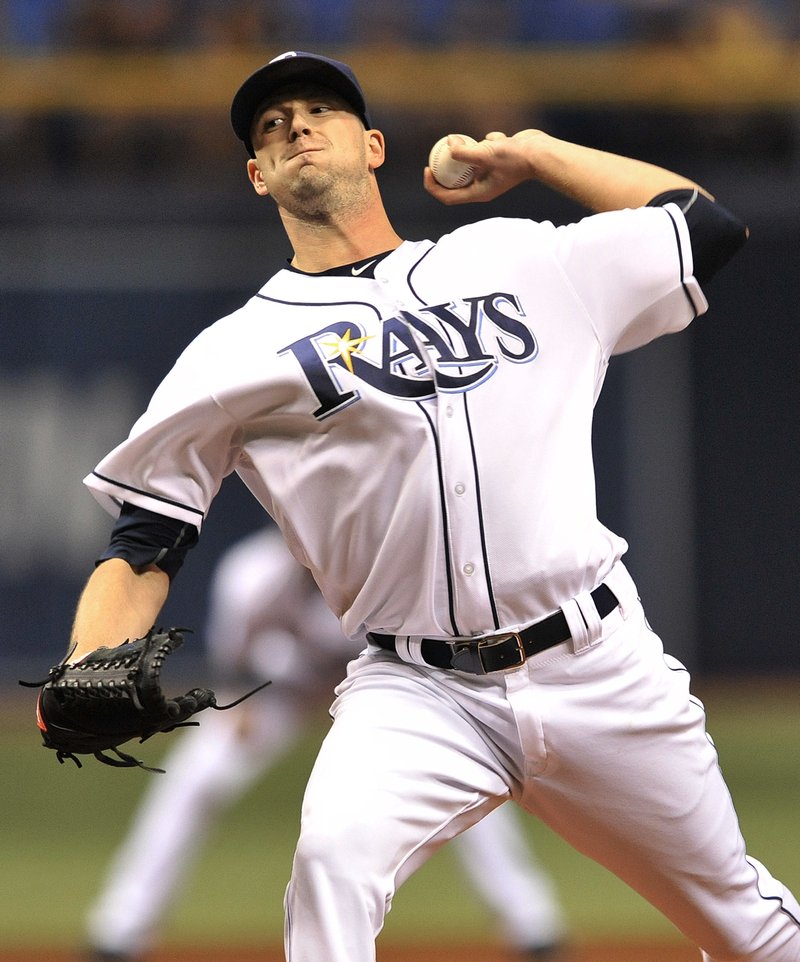 In this Tuesday, Sept. 20, 2016 file photo, Tampa Bay Rays starter Drew Smyly pitches against the New York Yankees during the first inning of a baseball game in St. Petersburg, Fla. The Mariners have made a pair of trades, landing left-handed starter Drew Smyly from the Tampa Bay Rays and right-hander reliever Shae Simmons from the Atlanta Braves, Wednesday, Jan. 11, 2017. 