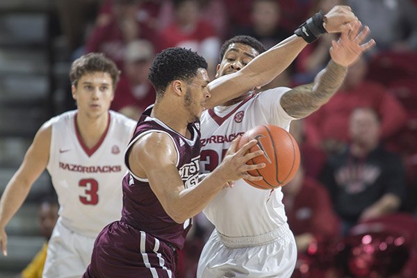 Arkansas' Anton Beard (31) guards Mississippi State's Quinndary Weatherspoon (11) during a game Tuesday, Jan. 10, 2017, in Fayetteville. 