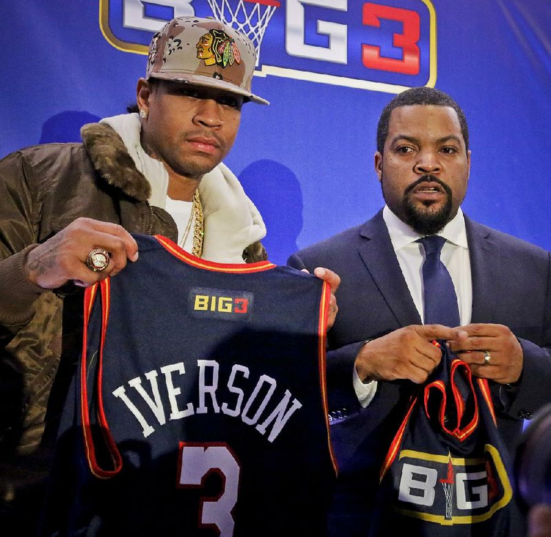 Former NBA player Allen Iverson (left) and entertainer Ice Cube announced the formation of Big 3, a new 3-on-
3 professional basketball league Wednesday.