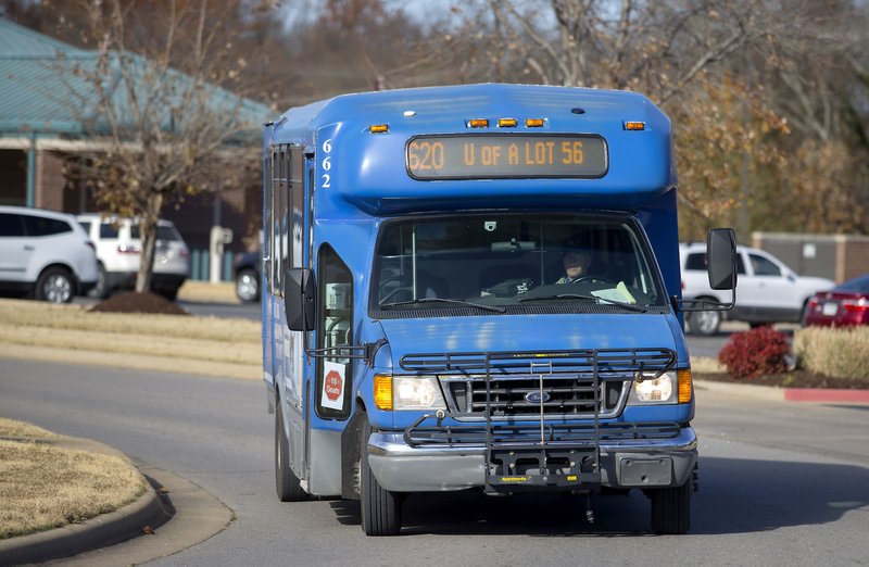 An Ozark Regional Transit bus approaches a stop at the Post Office in Farmington in December.