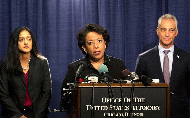 U.S. Attorney General Loretta Lynch holds a news conference Friday in Chicago, accompanied by Vanita Gupta of the Justice Department’s Civil Rights Division and Chicago Mayor Rahm Emanuel.