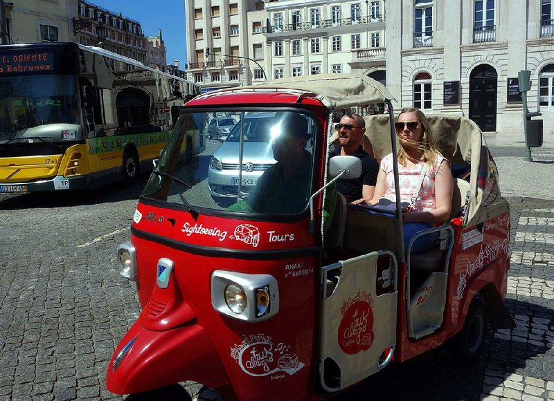 Little tuk-tuks are a fun way to sightsee around Lisbon. 