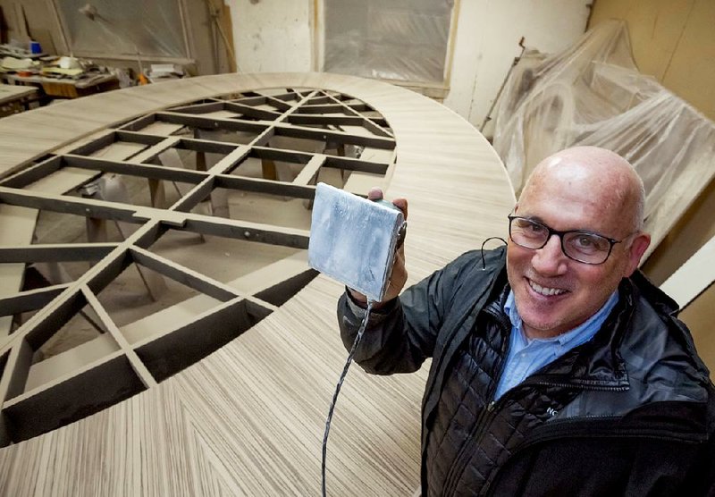 Conference tables made from exotic wood veneers are a specialty for Tommy Farrell, who started making furniture as a teenager.